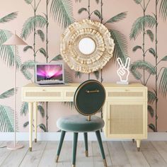 a desk with a mirror, chair and laptop on it in front of a palm tree wallpaper