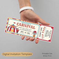 a person is holding up a carnival ticket