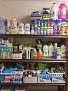 the shelves have many different types of cleaning products on them, including detergents and toiletries