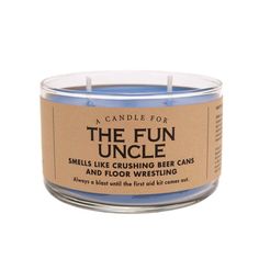 the fun uncle smells like crushing beer cans and floor wrestling scented candle in a glass container