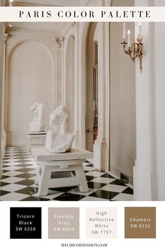 a room with black and white checkered flooring, chandelier and marble sculptures