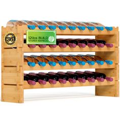 a wooden wine rack with blue and purple bottles on it's sides, in front of a white background