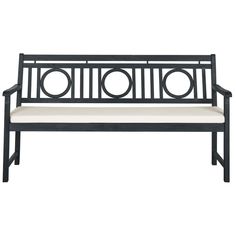 a black metal bench with white cushions