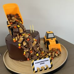 there is a construction zone cake on the table