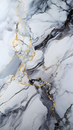 an abstract marble pattern with gold accents