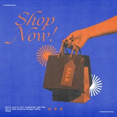 a hand holding a shopping bag with the words shop now on it and fireworks in the background