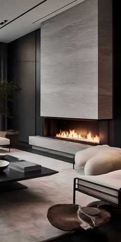 a modern living room with a fireplace in the center