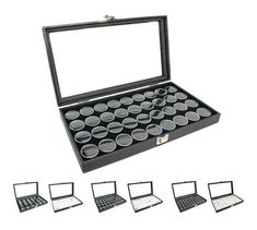 a set of twelve cups in a black box with four trays on each side