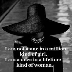 a woman wearing a large black hat with the caption i am not a one in a million kind of girl