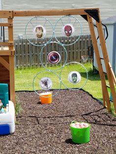 a child's play area with swings and toys