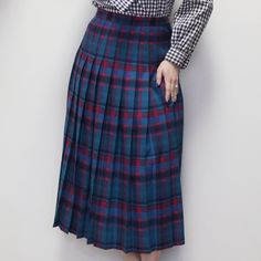 Vintage 80s High Waisted Pleated Midi Skirt by Pendleton, Pink and Teal Plaid Pure Virgin Wool Skirt. Size 10, made in the USA! Waist: 28" Hips: 44" Length: 31 1/4" pendleton pink teal wool pleat skirts 14.8 oz. Retro High Waist Skirt For School, Scottish Style Fitted Skirt For School, Scottish Fitted Skirt For School, Fitted Scottish Skirt For School, High Waist Plaid Pleated Skirt, Teal Plaid Skirt, Vintage Plaid Pleated Skirt, Retro Full Plaid Skirt, Vintage Plaid Cotton Skirt