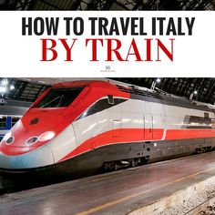 a red and white train traveling through a train station next to a sign that says how to travel italy by train