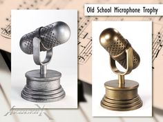 an old school microphone trophy with sheet music in the background