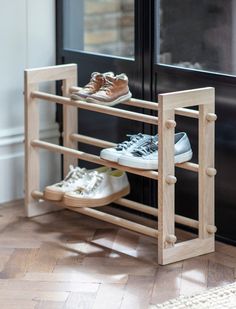 Simple yet super practical in design, the Hambledon Shoe Rack has space for up to three pairs on the rungs of each of its raw oak shelves. Keeping a total of nine pairs of shoes neatly organised, it is the ideal design for smaller hallways and is the perfect aesthetic match with the other items that feature in our bestselling Hambledon collection. Dimensions: H50 x W70 x D20cm Crafted in Oak For indoor use only Fully-assembled Fits 3 pairs of sho Simple Shoe Rack Ideas, Aesthetic Shoe Rack, Simple Shoe Rack, Wooden Shoe Storage, Wood Shoe Rack, Diy Shoe Rack, Crafty Decor, Wooden Shoe Racks, Perfect Aesthetic