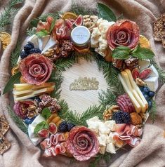 a wreath made out of dried fruits and vegetables