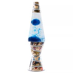 a tall glass vase with blue liquid in it's center and two faces on the top