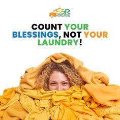 a woman under a blanket with the words count your blessing, not your laundry