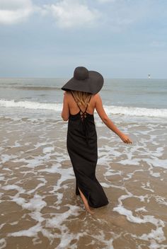 Dress to impress in our black Adriana maxi dress! This flowy dress features an open back with a drawstring to tie and slits at the bottom for an extra flair. Though unlined, the dress is not sheer. Sizes: S-M / M-L S-M: Length 50.39 in - Width 15.35 in M-L: Length 51.18 in - Width 16.14 in 70% cotton - 30% linen Washing: handwash Parisian Summer, Parisian Women, Perfect Little Black Dress, Midi Length Dress, Feminine Look, Flowy Dress, Spring Summer Fashion, Dress To Impress, Open Back