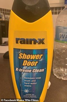 a bottle of rainx shower door k - treme clean sitting on a counter