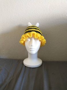 Hiiii this is a cute little bee hat! My sizing is for an average head, but of you need it smaller or bigger, just message me! Bee Headband Grasshopee, Cute Mini Cap Hat One Size, Cute Mini Hat, Cute Costume Cap Hat, One Size Fits Most, Cute Costume Hats And Headpieces, Cute One Size Beanie Bonnet, Cute Brimmed Crochet Hat One Size, Cute One-size Brimmed Crochet Hat, Cute Adjustable Brimmed Bonnet