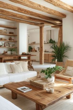 a living room filled with furniture and wooden beams