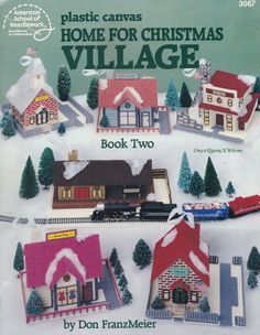 the front cover of plastic canvass home for christmas village book two