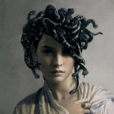 a painting of a woman with snakes on her head and hair wrapped around her shoulders