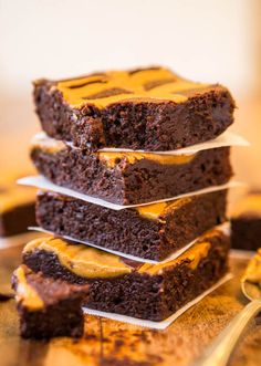 four pieces of brownie stacked on top of each other