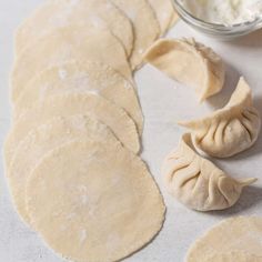 the dough is ready to be made into dumplings and other ingredients are scattered around