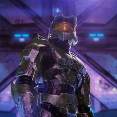 a man in a sci - fi suit standing in front of a purple and blue background