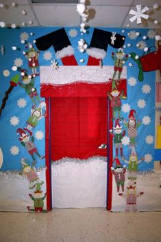 a decorated christmas door with santa's sleigh and snowmen