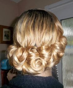 the back of a woman's head with blonde hair