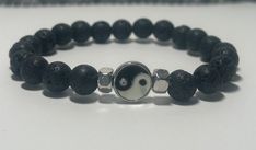 Unisex bracelet, perfect gift for a boyfriend or girlfriend. Symbol of Yin Yang The yin yang symbol is a circle made up of black and white swirls, each containing a spot of the other. The two halves intertwine across a spiral-like curve that splits the whole into semicircles. The small dots represent the idea that both sides carry the seed of the other, and the curvy line signifies that there are no absolute separations between the two opposites. This bracelet is made with double stretch cord an Yin And Yang Bracelet, Gift For A Boyfriend, Friendship Necklaces Yin Yang, Yin Yang Beads, Yin Yang Bracelet, Bracelet For Him, Yin Yang Symbol, Yin Yang Charm, A Boyfriend