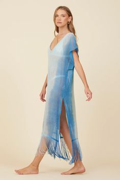 Your new favorite coverup for your next vacay, the new Metallic Mesh Knit Cover Up in Blue! Perfect for summer days, this coverup will have you looking stylish and feeling comfortable. Say goodbye to boring coverups and hello to fun in the sun with this metallic beauty featuring tassels at the bottom! Blue Breezy Summer Cover-up, Blue Bohemian Cover-up For Beach Party, Blue Beachy Cover-up For Beach Season, Blue Beach Dress Cover-up For Spring, Blue Spring Beach Dress Cover-up, Blue Beach Dress For Spring Cover-up, Blue Beach Dress For Spring Season, Blue Summer Beach Dress Cover-up, Blue Cover-up For Spring Vacation