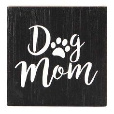 a black and white sign that says dog mom with a paw print on the front