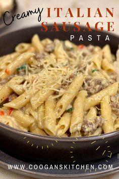 creamy italian sausage pasta in a black bowl