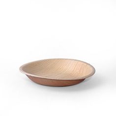 a wooden bowl on a white background