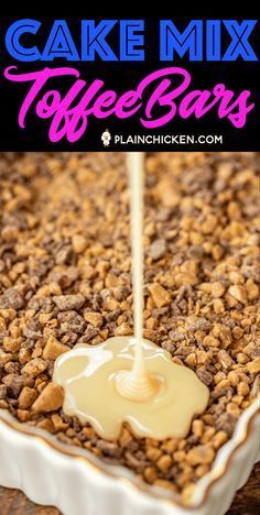 cake mix toffee bars in a baking pan with icing being poured on top