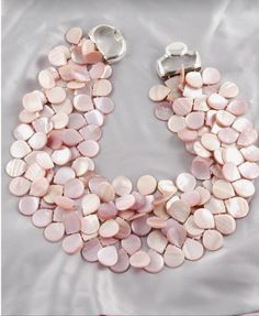 Luxury Statement Mother Of Pearl Necklace, Luxury Artisan Necklace With Mother Of Pearl, Luxury Handmade Mother Of Pearl Shell Necklace, Luxury Mother Of Pearl Shell Necklace, Elegant Multi-strand Mother Of Pearl Jewelry, Elegant Pink Mother Of Pearl Necklace, Elegant Multi-strand Mother Of Pearl Necklaces, Elegant Round Coral Necklace, Elegant Multi-strand Mother Of Pearl Necklace