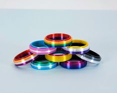 These pride fidget rings are 3D printed in colors to match a large selection of pride flags. They are printed in PLA which is a sustainable plant-based plastic. They are also custom-sized to US ring sizes. Due to 3D printing with color changes, there may be minor blemishes in the plastic, however, I will ensure each ring is uniform and smooth to the touch. I designed these rings for pride month to create more options of fidget rings for many genders and sexualities. If you'd like discreet packag Lgbtq Flag, Lgbtq Funny, Lgbtq Flags, Lgbt Love, Fidget Rings, Spinner Ring, Crochet Shoes, Spinner Rings, Pride Flag