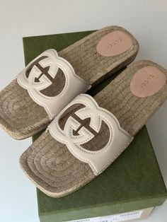 size 40G - According to Gucci size chart it is 10US  Gucci Espadrille White GG cutout slide sandal New in box with dust bag White Gucci Sandals For Summer, Gucci Espadrille, White Gucci Sandals With Branded Insole, White Flat Gucci Slides, White Gucci Slip-on Slides, Gucci Cushioned Open Toe Slides, Gucci Espadrilles, Slide Sandals, Flat Shoes Women