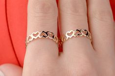 Our heart band ring is 14k solid gold, and it's available in gold and rose gold. It is a half eternity band that is consist of open hearts. If you consider this open heart ring as a gift for birthdays, valentine's day, mother's day, anniversaries, or graduation, it makes happy your loved ones.   🎁 If you want, you can add a gift note for your loved ones. It arrives in a special jewelry gift box. ✨ We respond to your questions happily. Your question will be answered within 24 hours. Do not hesit Open Heart Ring, Heart Band, Heart To Heart, Gold Ring Designs, Gold Designs, Solid Gold Ring, Half Eternity Band, Ring Minimalist, Solid Gold Rings