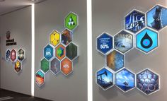 the wall is decorated with hexagons and magnets