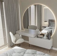 a bedroom with a round mirror on the wall next to a bed and desk in front of a window