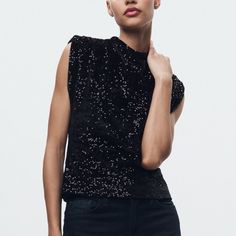 Zara Woman Collection Sleeveless Round Neck Top With Shoulder Pads. Tonal Sequin Appliqu. Chic Stretch Vest For Party, Chic Sleeveless Sequin Blouse, Chic Sequined Sleeveless Blouse, Sleeveless Evening Tops For Fall, Chic Tank Top For Fall Night Out, Black Sleeveless Glamorous Top, Sleeveless Tops For Night Out In Fall, Glamorous Black Sleeveless Top, Chic Stretch Vest For Night Out