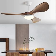 a modern ceiling fan in the middle of a dining room