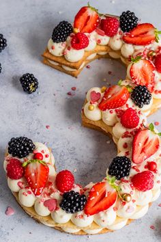 an image of the letter s made out of fruit on top of some waffles