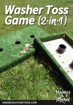 a game that is in the grass with some cups on it and two holes to put coins