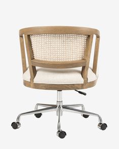 an office chair with wheels on the back and seat upholstered in white fabric