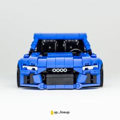 a blue lego car is shown on a white background